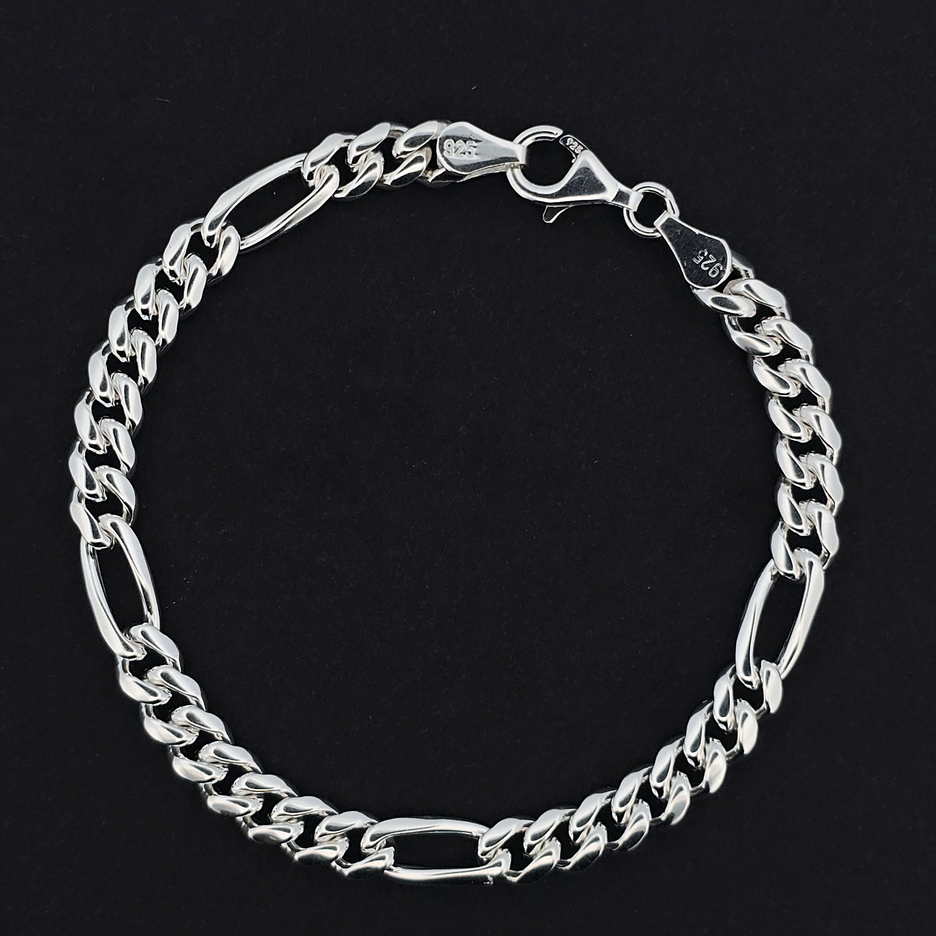 Zilveren armband met Figaro schakel, 6.25 mm breed en 20 cm lengte.